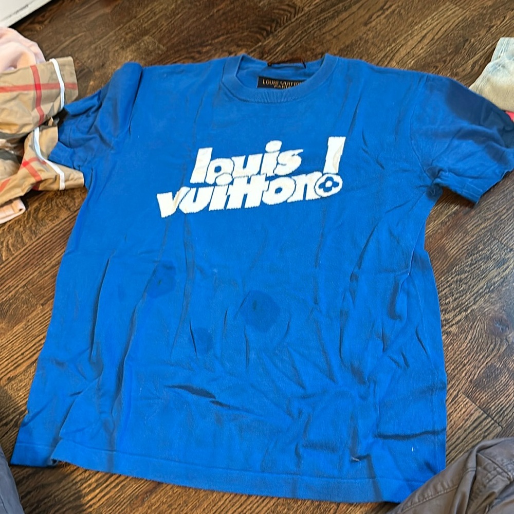 Louis Vuitton blue T-shirt. Currently Spot treating the three small stains.